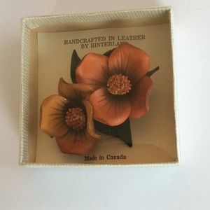 Unique flower brooch crafted from real leather.